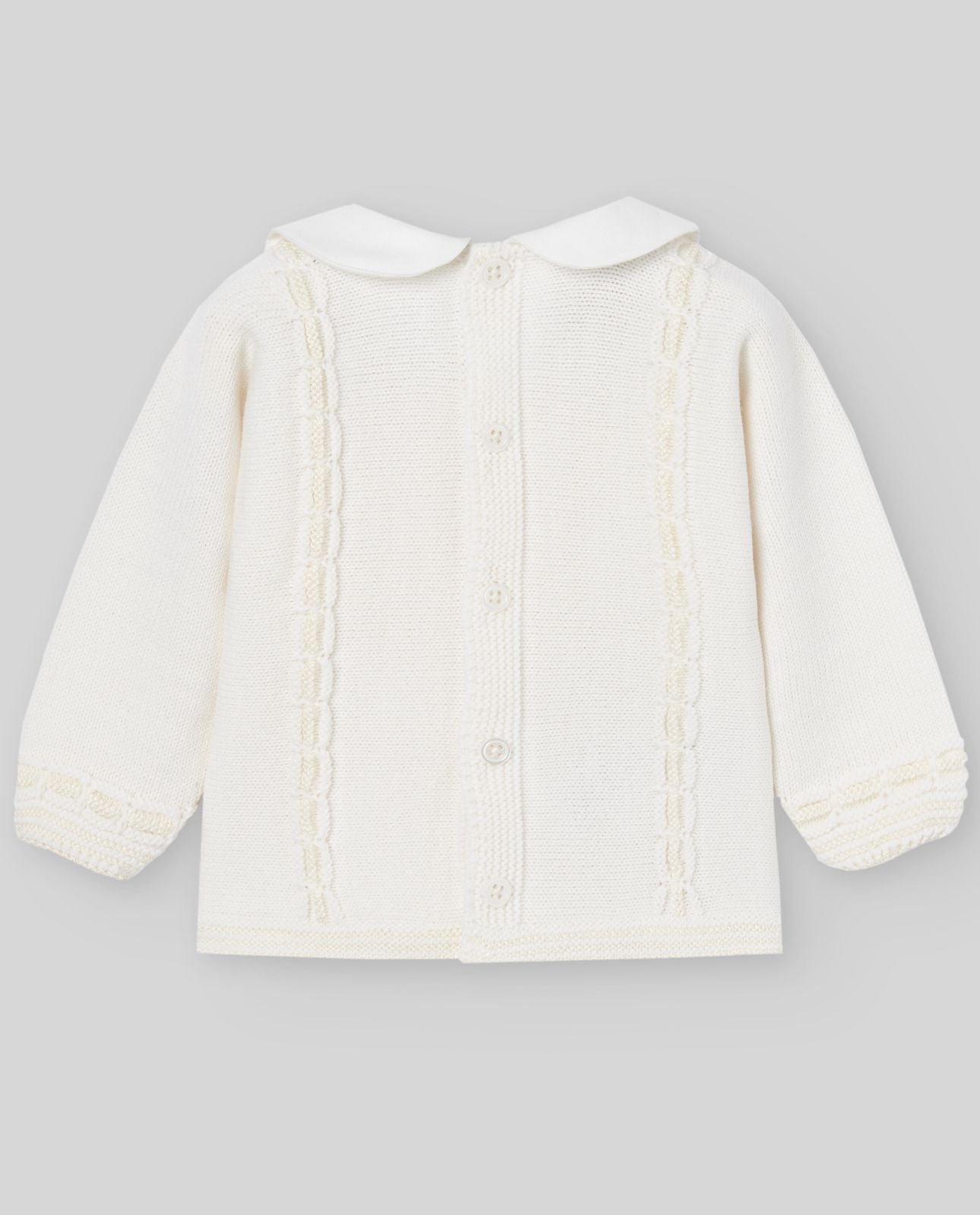 A baby is wearing a white sweater with a white collar.;A baby is wearing a white sweater with a white collar.;A pair of white knitted baby pants with feet on a white background.;A pair of white baby pants with feet on a white background.
