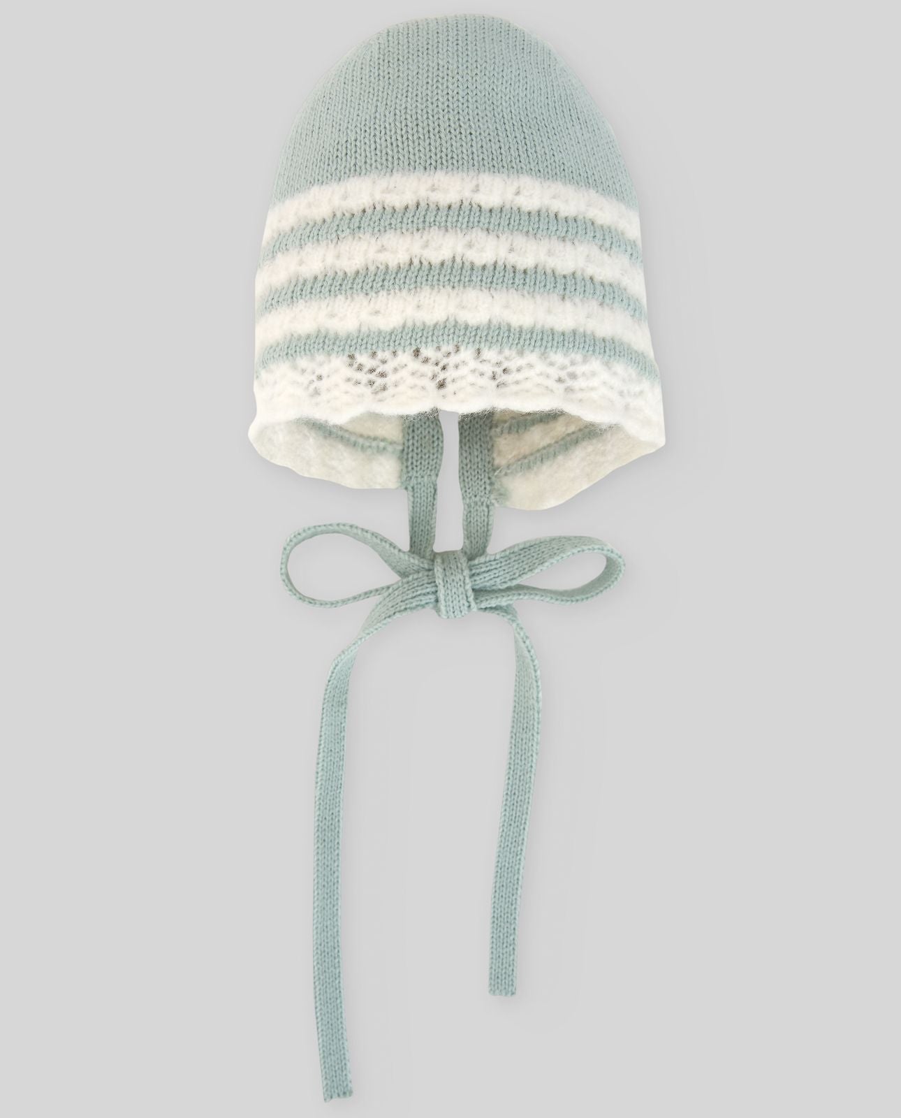 A knitted hat with white stripes and a bow;A blue and white striped hat with a tie around the neck