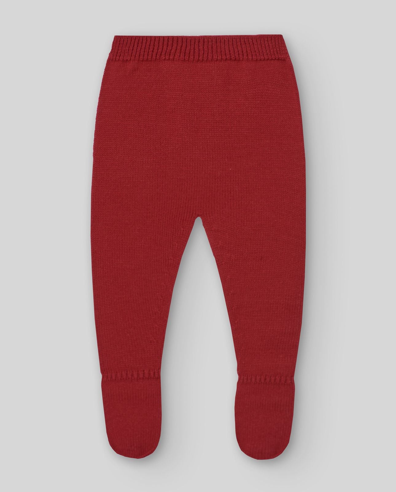 A baby is wearing a red sweater and pants with a snowflake on it.;A red sweater with a white snowflake on it;The back of a red sweater with white trim and buttons.;A pair of red knitted baby pants with feet