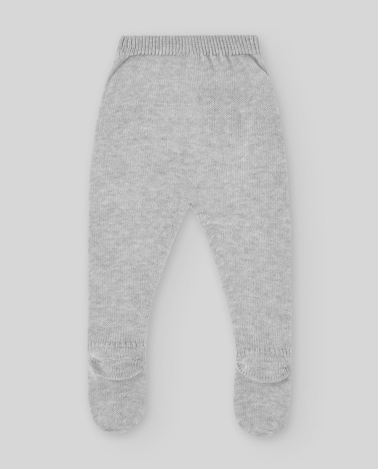 A baby girl is wearing a grey sweater with white trim.;A baby is wearing a grey sweater with white buttons on the back.;A pair of gray knitted pants with feet on a white background.;A pair of gray knitted pants with feet on a white background.