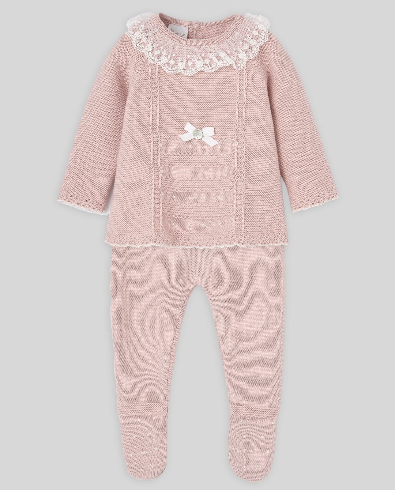 A baby girl is wearing a pink knitted onesie with a lace collar.;A baby girl is wearing a pink sweater with a lace collar.;A pair of pink baby pants with feet on a white background.;A pair of pink baby pants with feet on a white background.