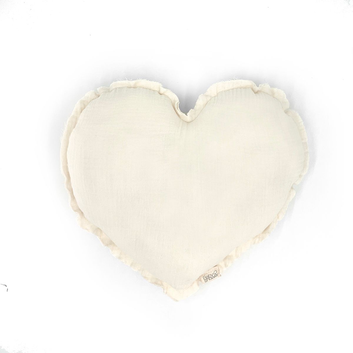 A green heart shaped pillow on a white background.;A white heart shaped pillow on a white background.;A white heart shaped pillow on a white background.;A heart shaped pillow is sitting on a white surface.;A baby is sleeping under a canopy with a mobile hanging from it.