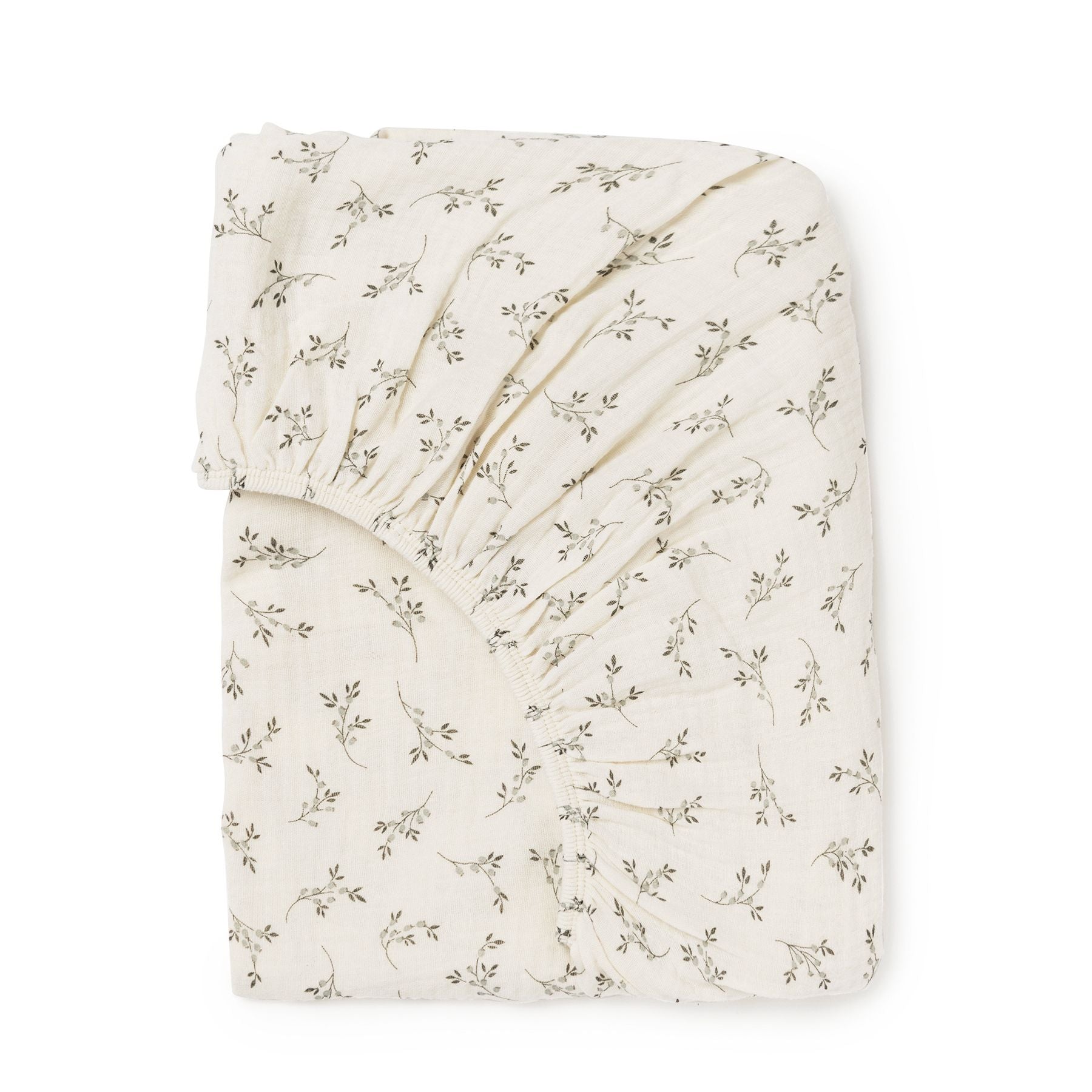 A white sheet with black flowers on it