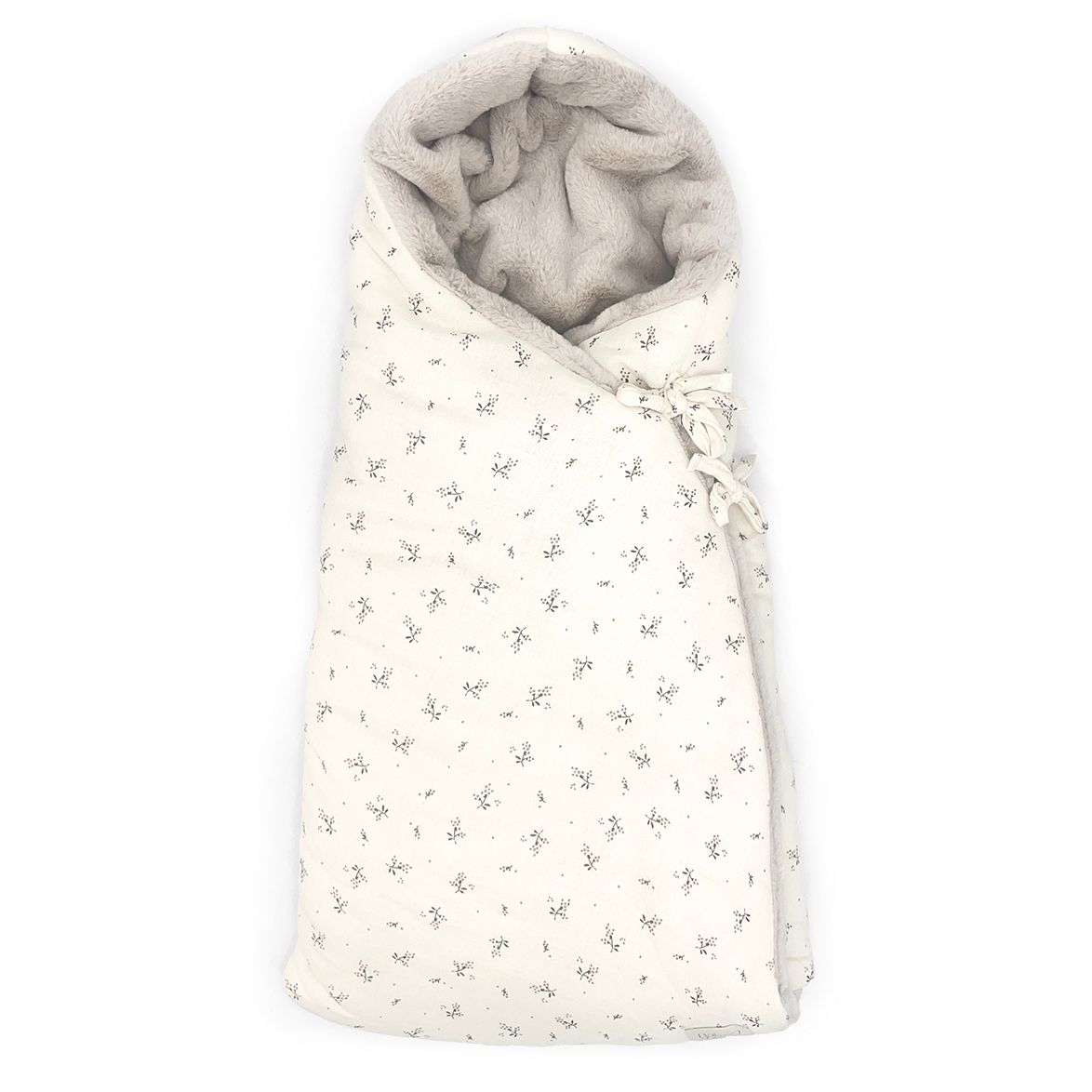 A white blanket with a pattern of stars on it
