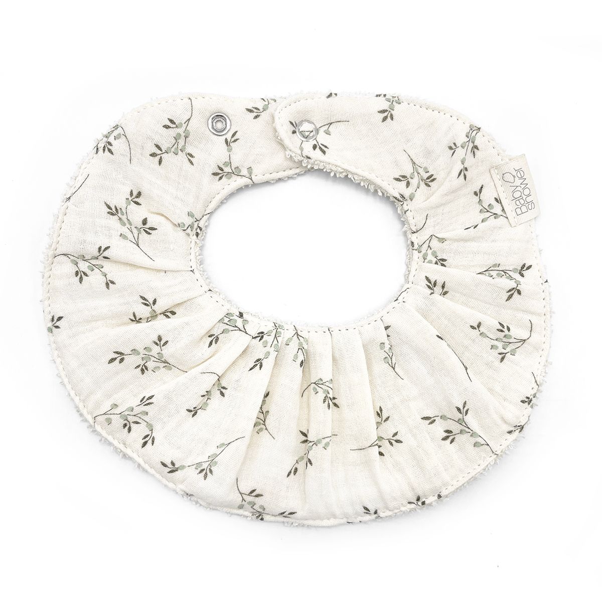 A white bib with flowers on it is on a white background.