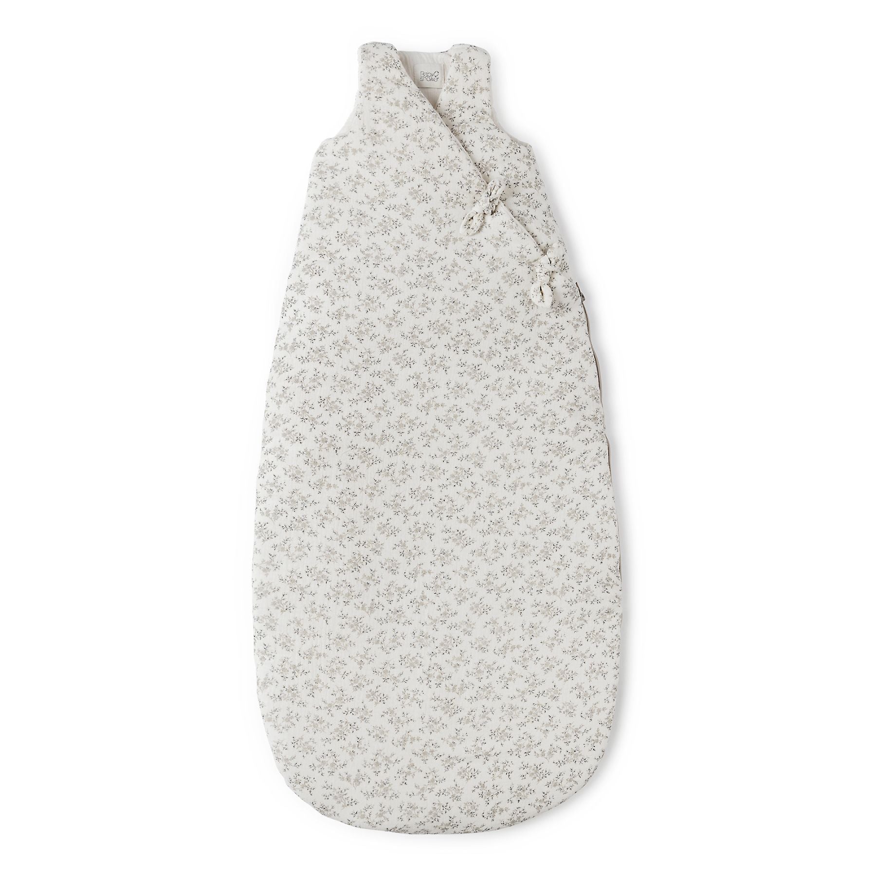 A white baby sleeping bag with a floral print on a white background.