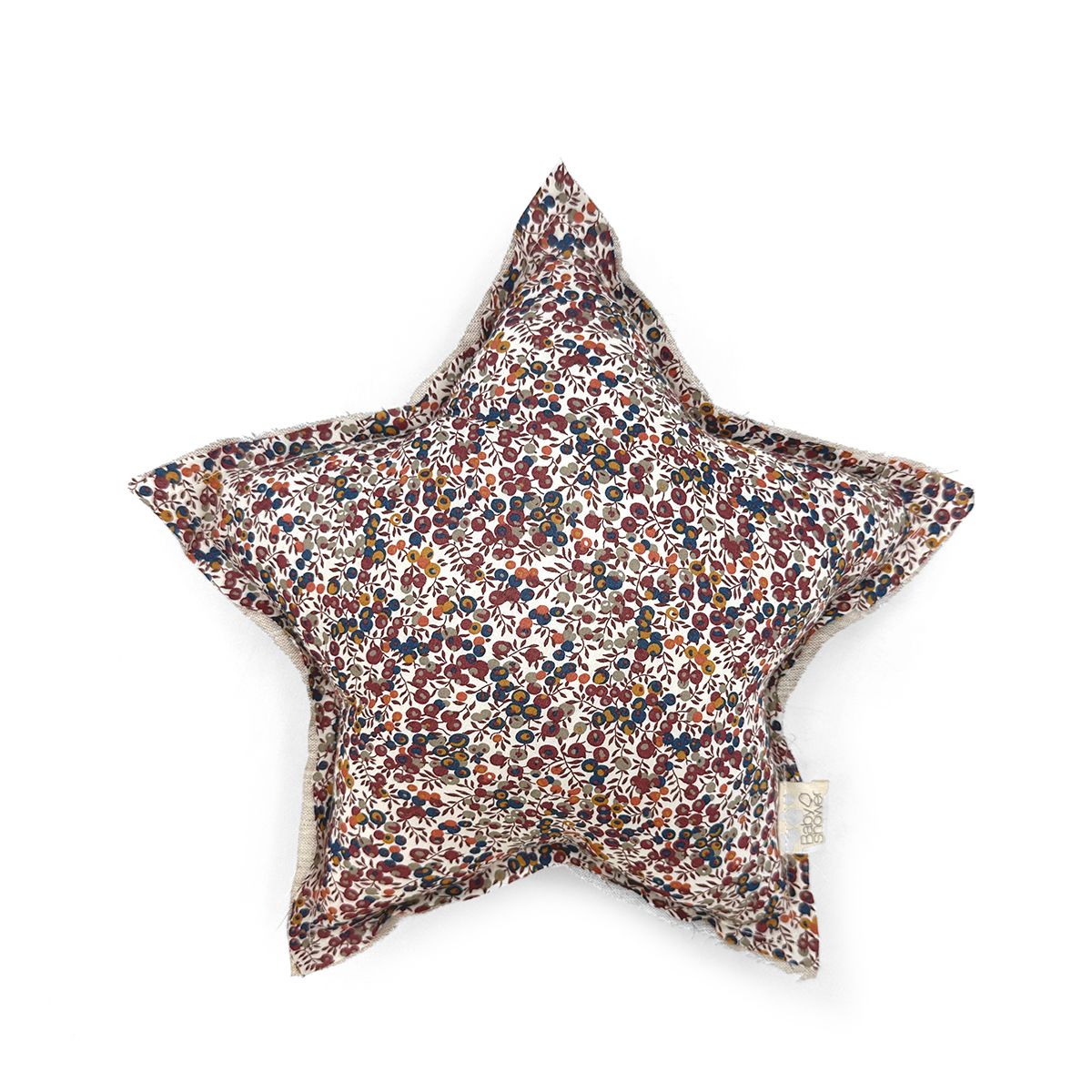 A star shaped pillow with a floral pattern on it.
