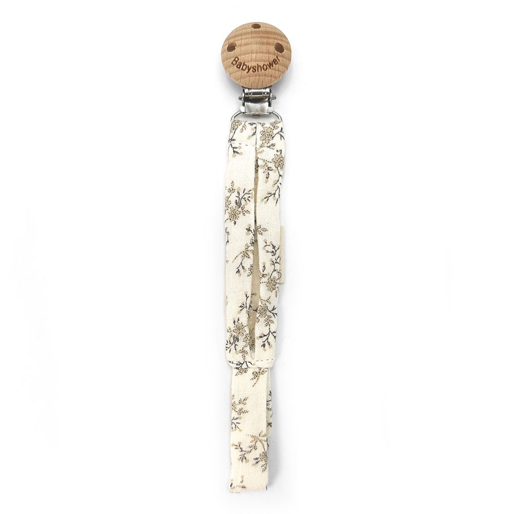 A pacifier clip with a wooden clip on a white background.