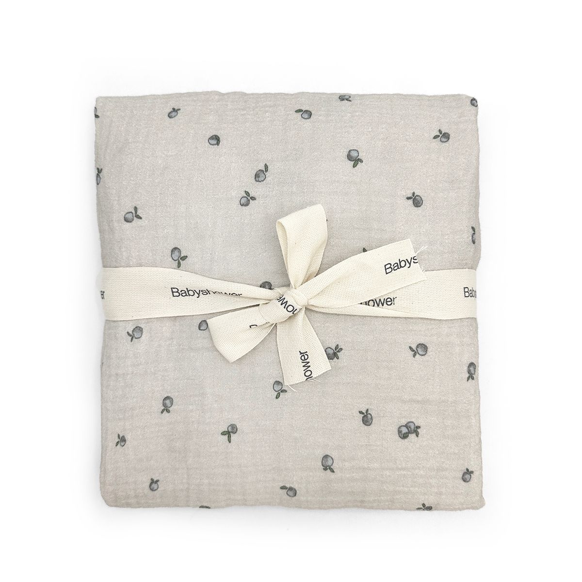A blanket with a ribbon tied around it on a white background.
