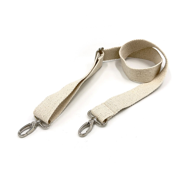 A beige strap with silver hooks on a white background