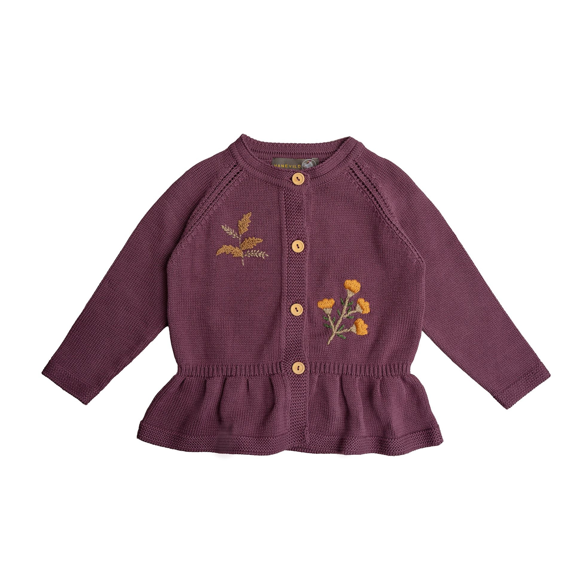 A baby girl is wearing a purple cardigan with flowers embroidered on it.;A purple sweater with ruffles on the bottom is on a white background.;A close up of a purple sweater with a flower embroidered on it.;A close up of a purple sweater with yellow flowers embroidered on it.