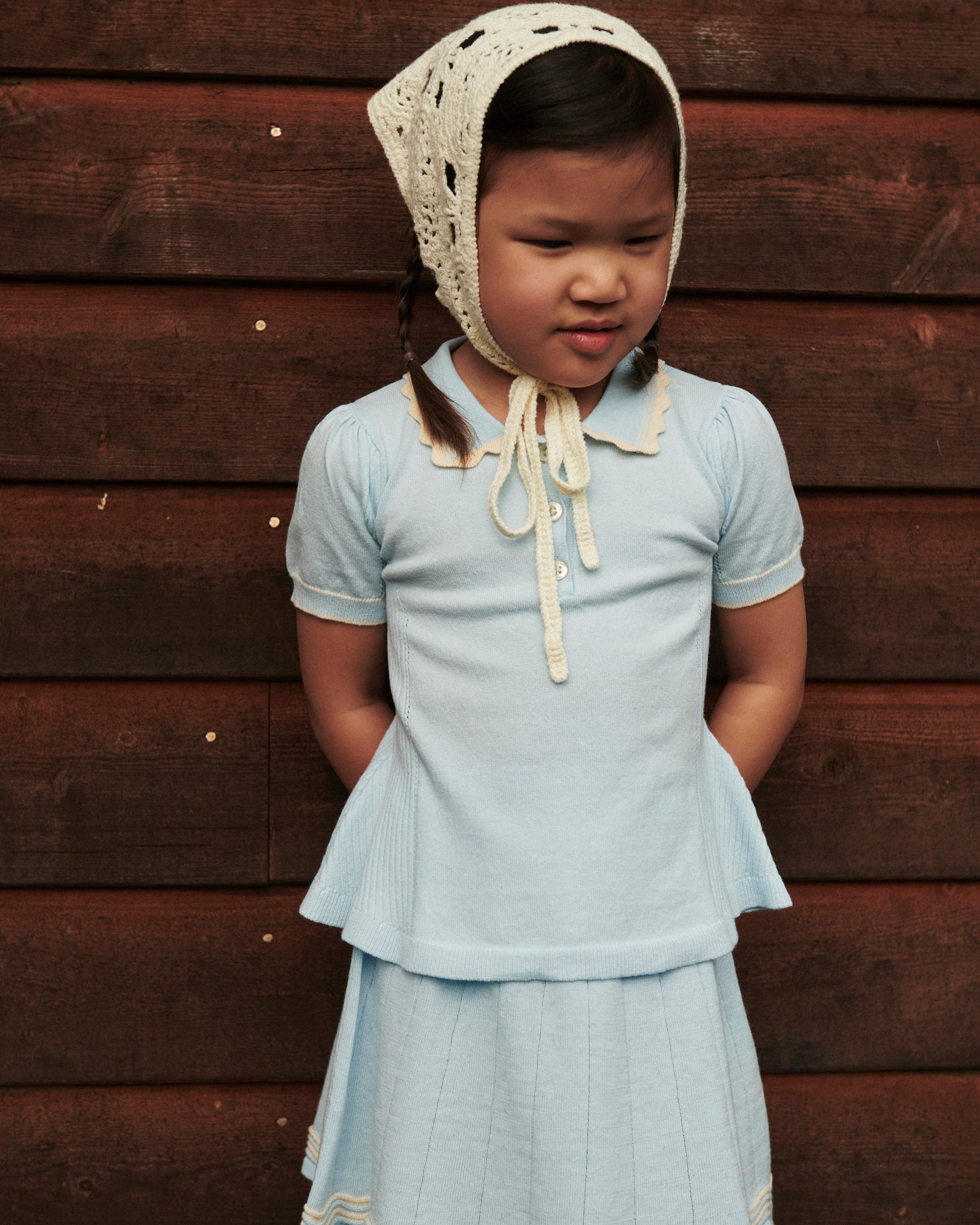 KNITTED PEPLUM BLOUSE