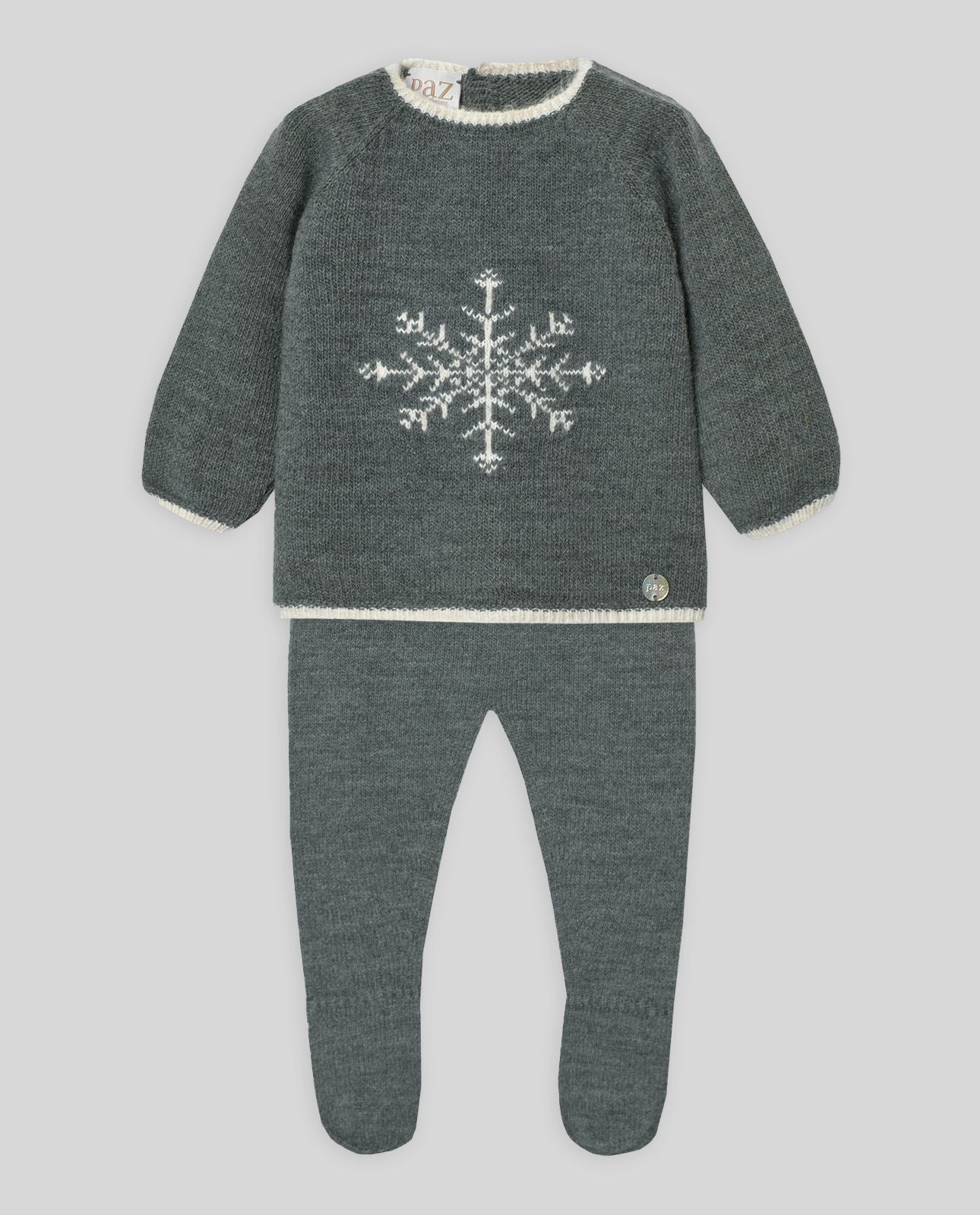 A baby is wearing a sweater and pants with a snowflake on it.;A grey sweater with a white snowflake on it.;A baby is wearing a grey sweater with white trim.;A pair of grey baby pants with feet on a white background.