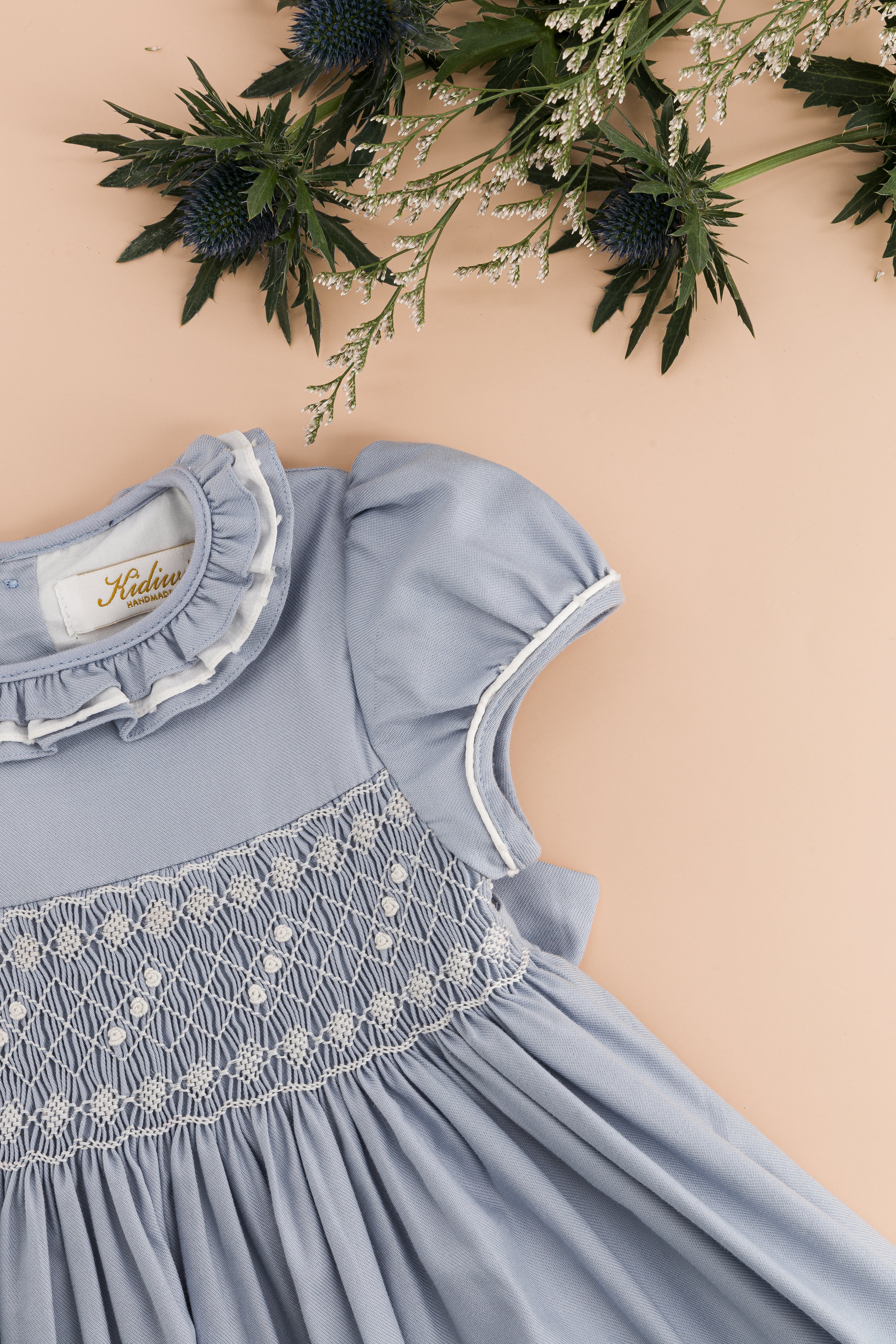 Hars, smocked dress, in Artic blue organic cotton twill