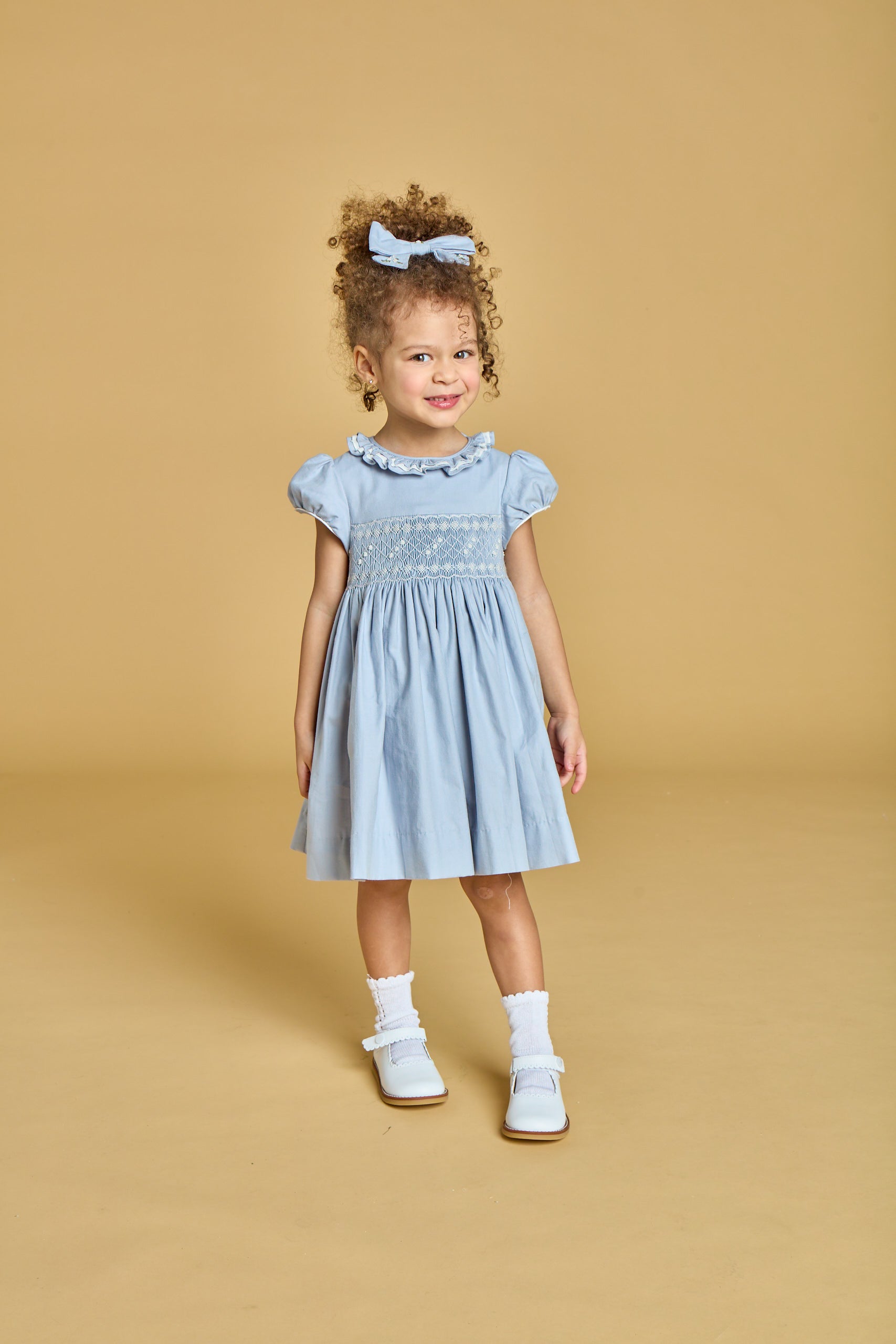 Hars, smocked dress, in Artic blue organic cotton twill