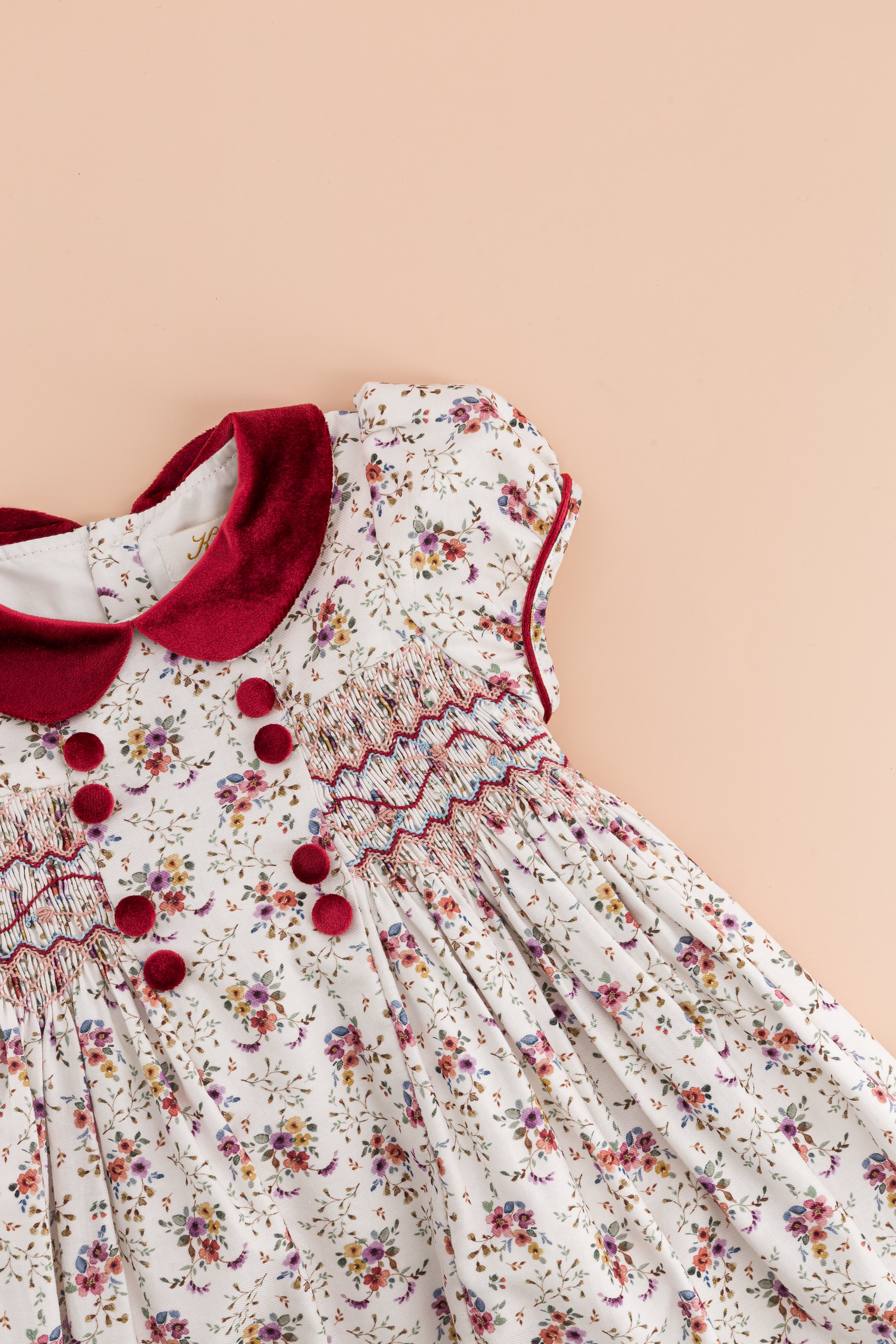 Rison, smocked dress, in Winter bouquet print with burgundy velvet collar