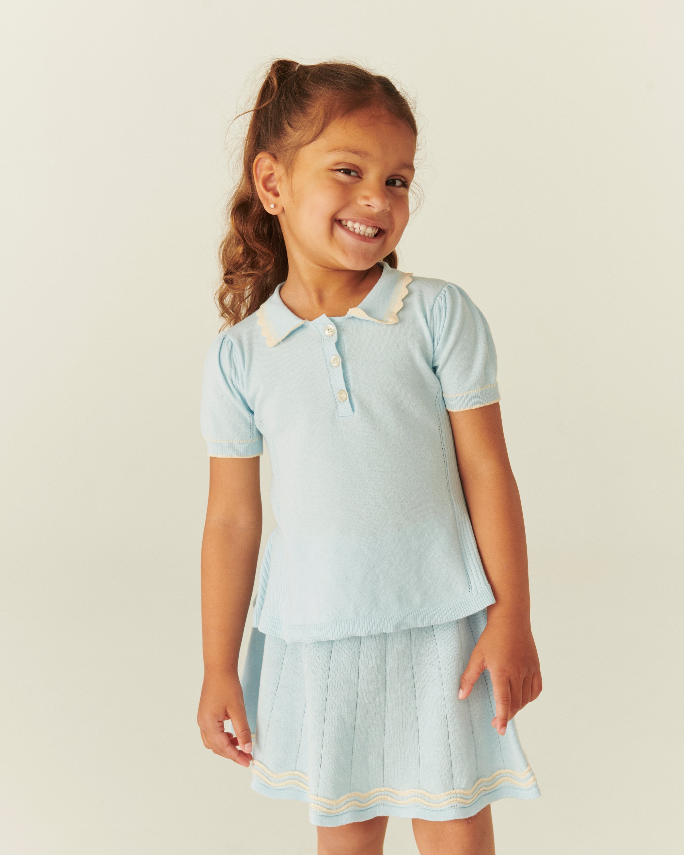 KNITTED PEPLUM BLOUSE
