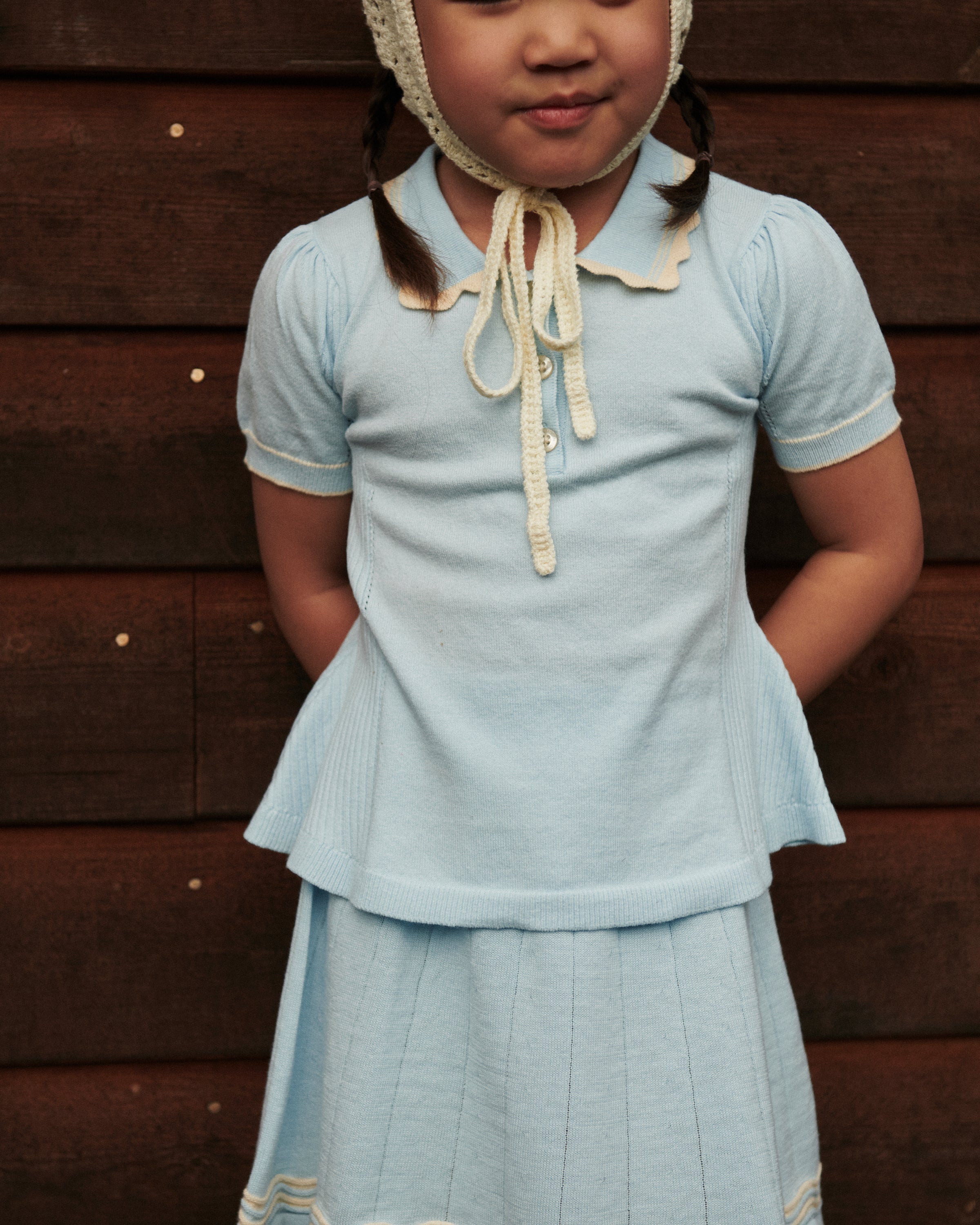 KNITTED PEPLUM BLOUSE