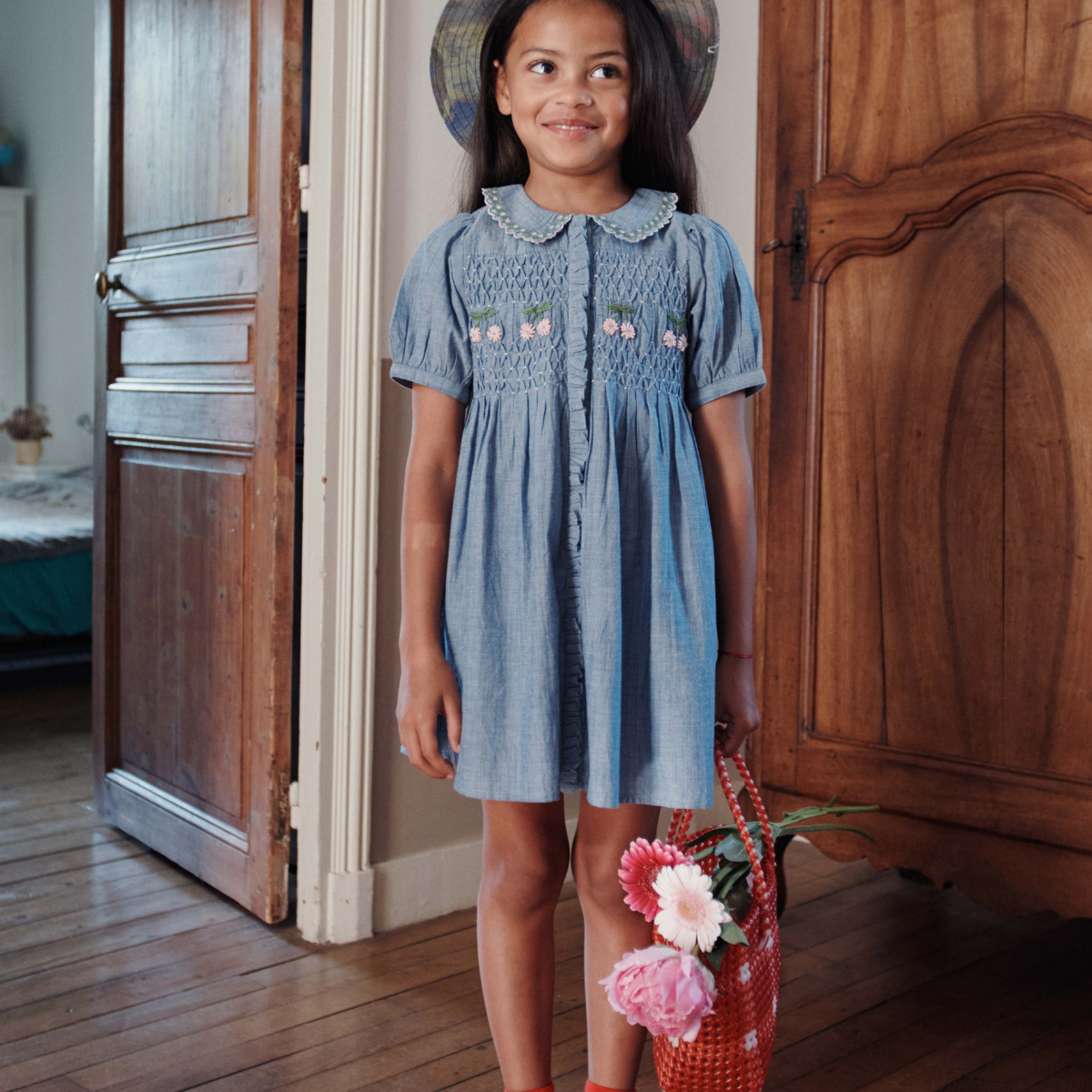 CHAMBRAY SMOCKED HAND EMBROIDERED DRESS